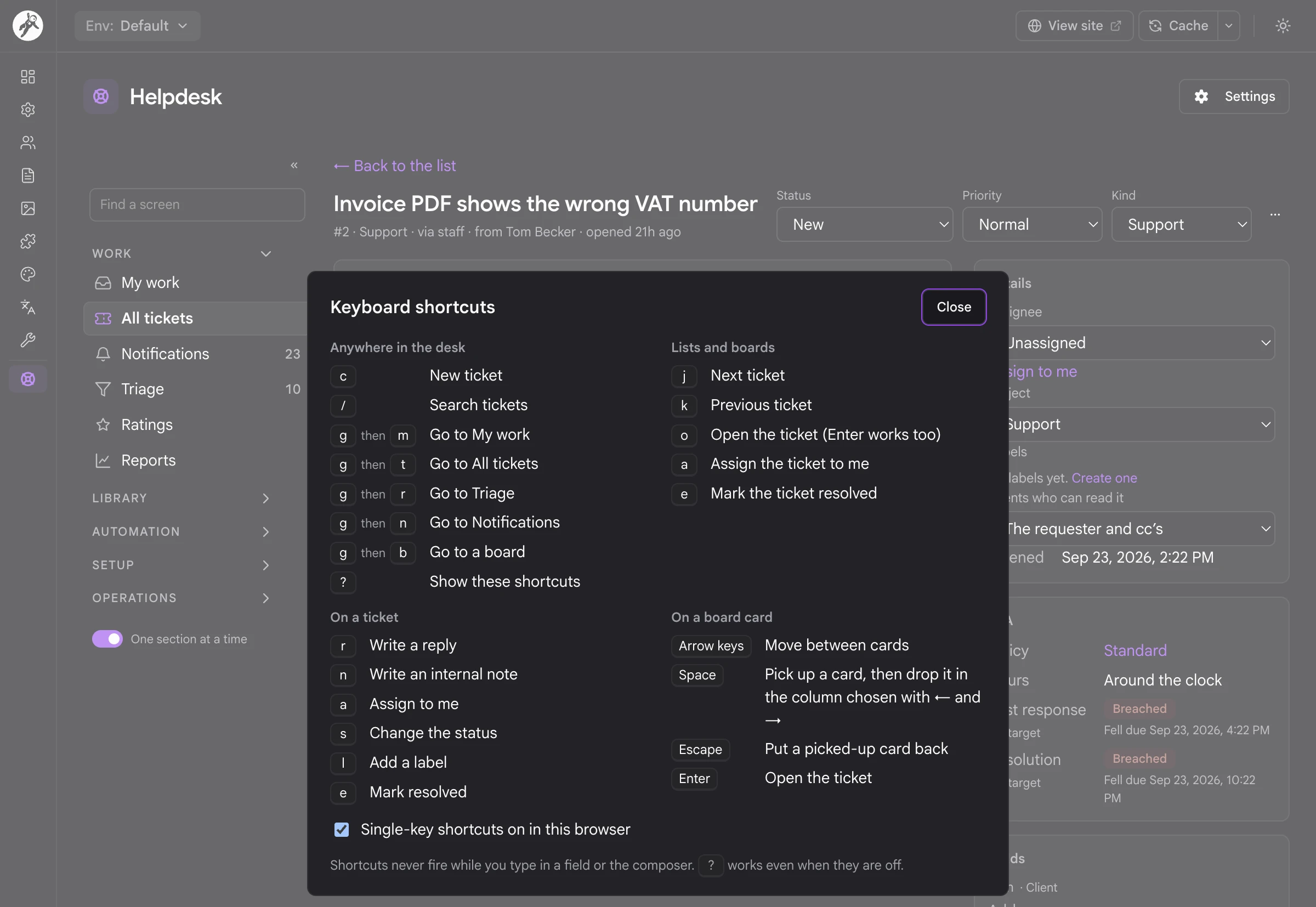 The keyboard shortcut sheet open over a ticket